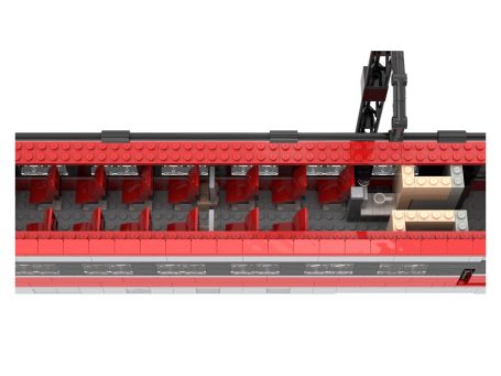Tren Alta Velocidad IRYO Frecciarossa ETR 1000 S109 MOC Lego - Detalle del interior Vista superior de un tren con asientos rojos y un carro de carga.